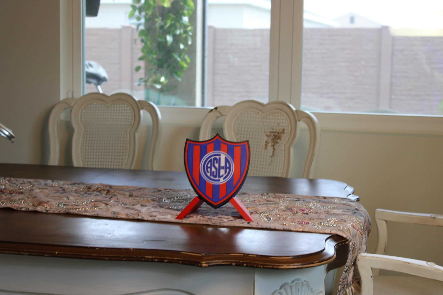 San Lorenzo 3D Printed Emblem on dining table, vibrant colors, no assembly required, perfect for fans.