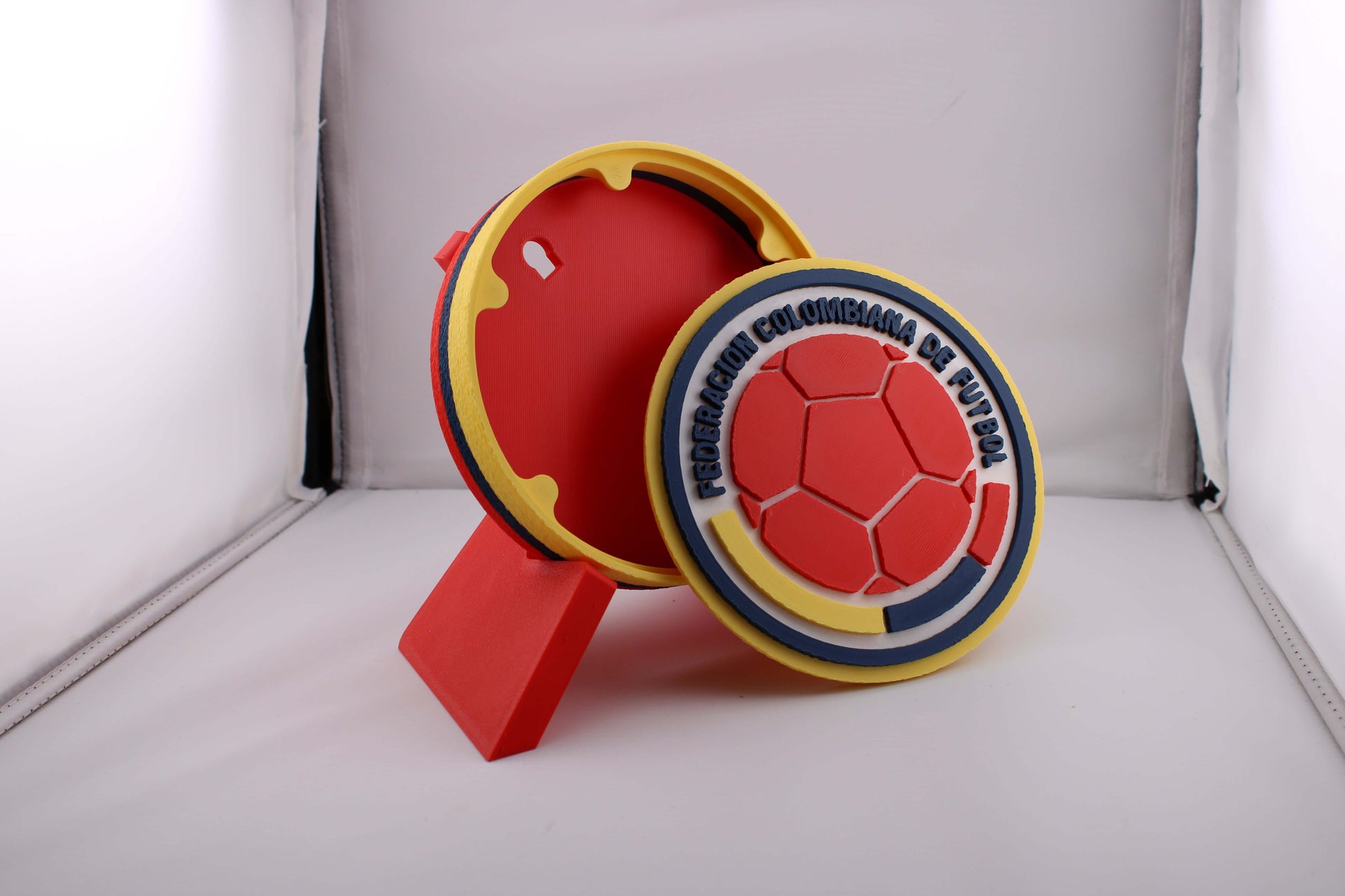Colombia 3D printed soccer emblem in vibrant colors, showcasing unique craftsmanship for proud Cafeteros fans.