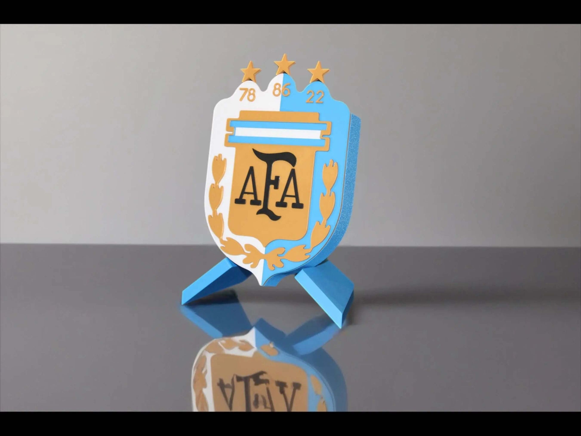 3D printed Argentina emblem honoring AFA crest with World Cup victories, vibrant colors and high quality materials.