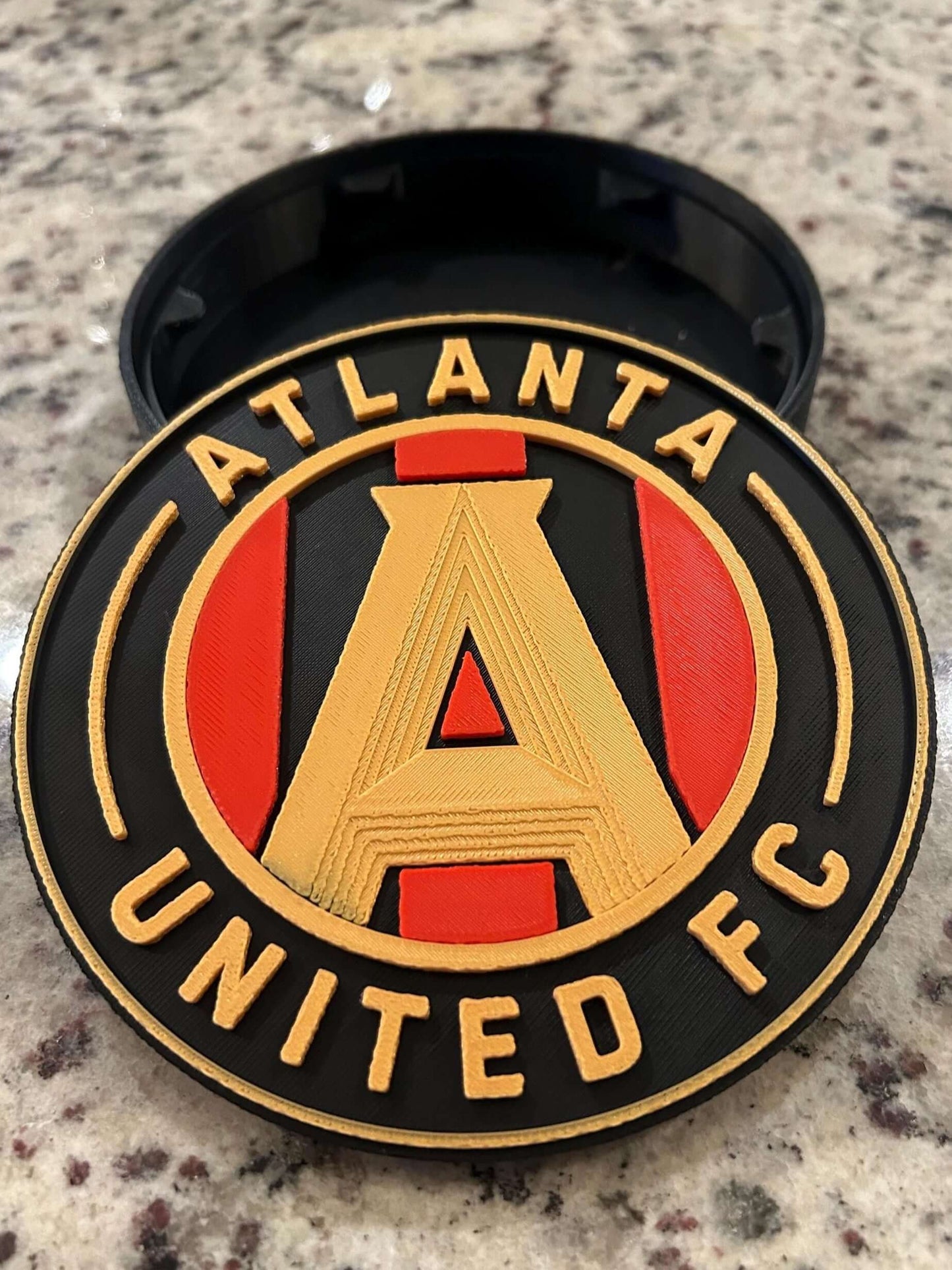 3D printed Atlanta United FC plaque showcasing the iconic Five Stripes shield in vibrant colors.