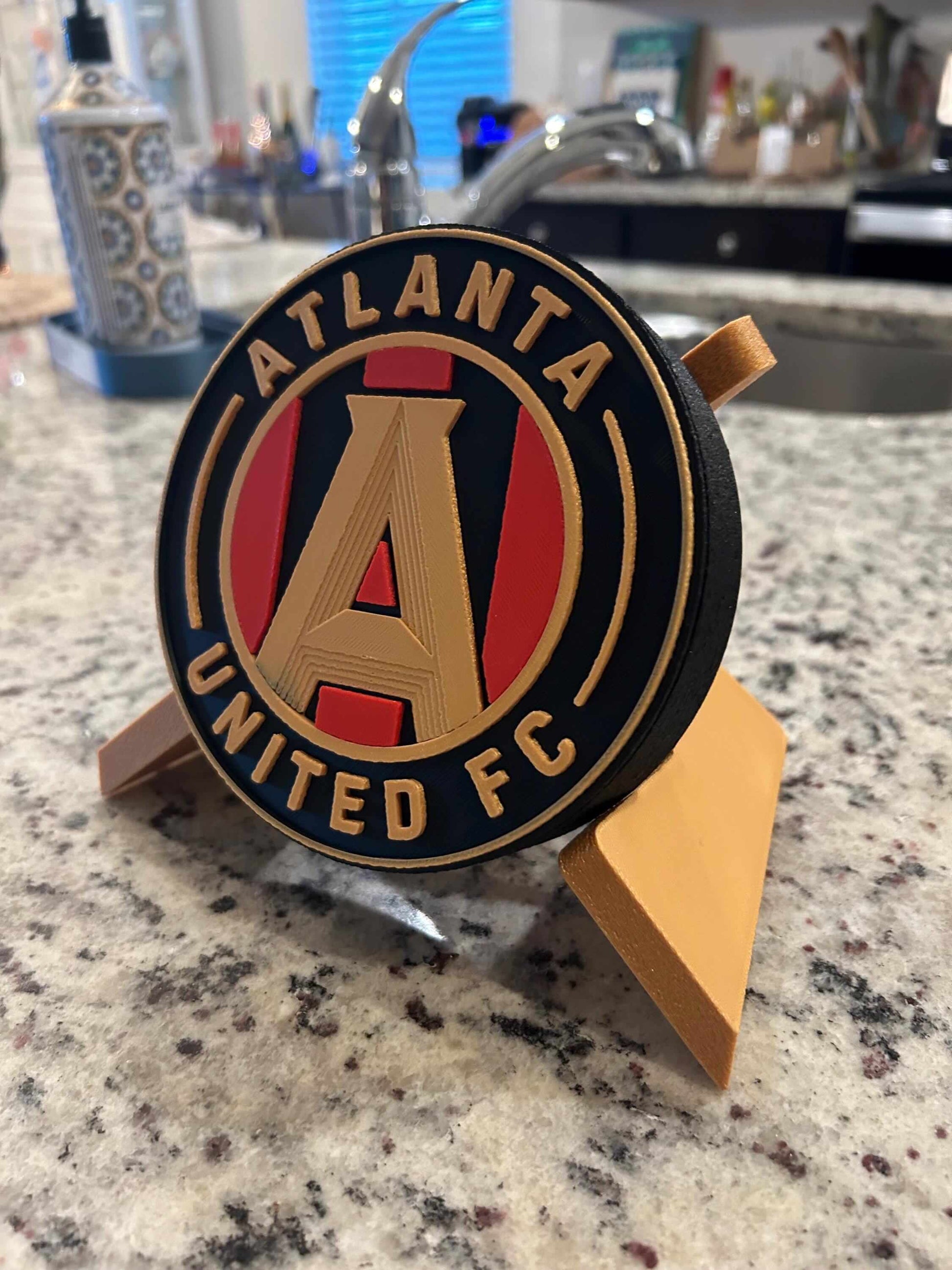 Atlanta United FC 3D printed plaque showcasing vibrant Five Stripes shield, perfect customizable decor for soccer fans.